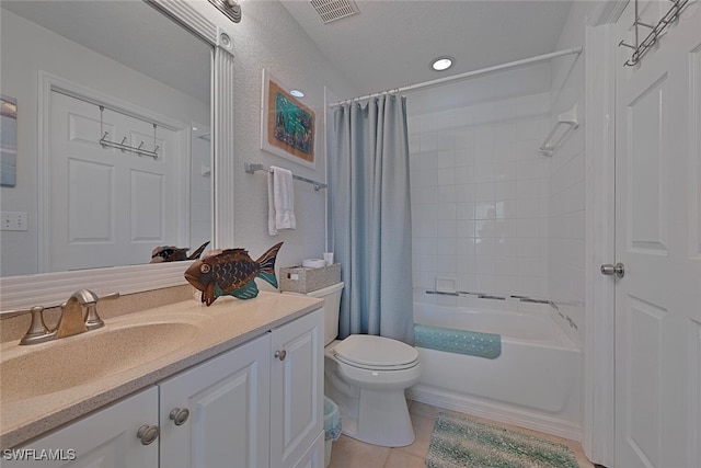 full bathroom with toilet, tile patterned floors, vanity, and shower / bath combo