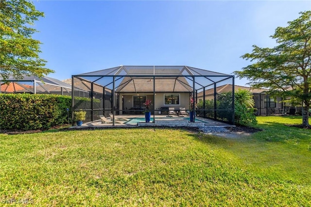 view of yard with a lanai and a patio