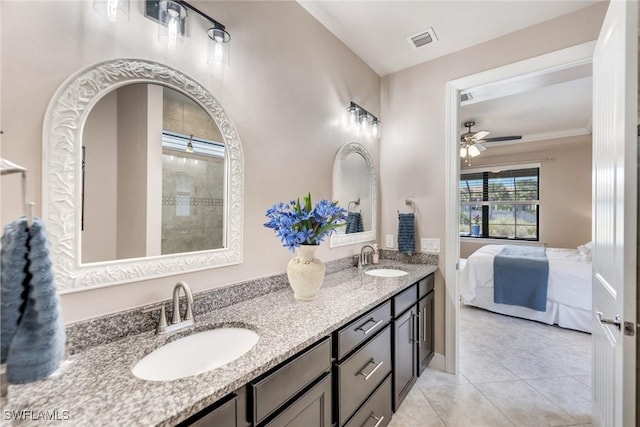 bathroom with ceiling fan, vanity, and tile patterned floors