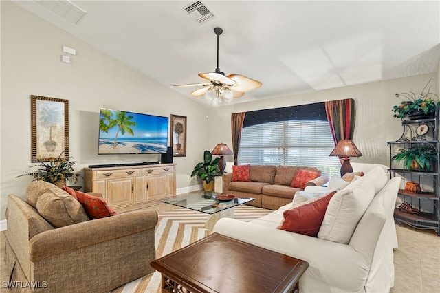 living room with ceiling fan and lofted ceiling