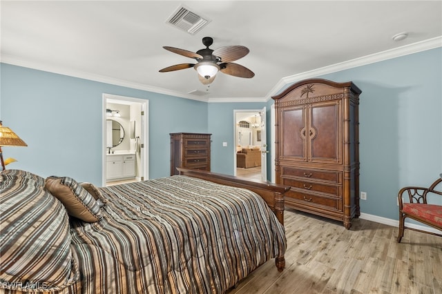 bedroom with ensuite bath, ceiling fan, crown molding, and light wood-type flooring