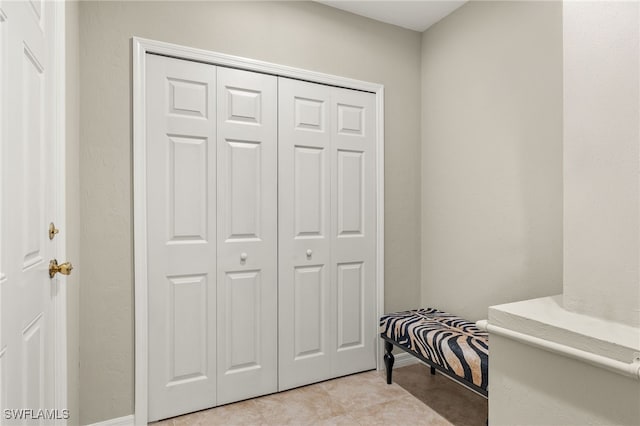 interior space featuring light tile patterned flooring