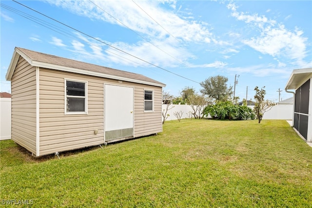 view of yard featuring a storage unit