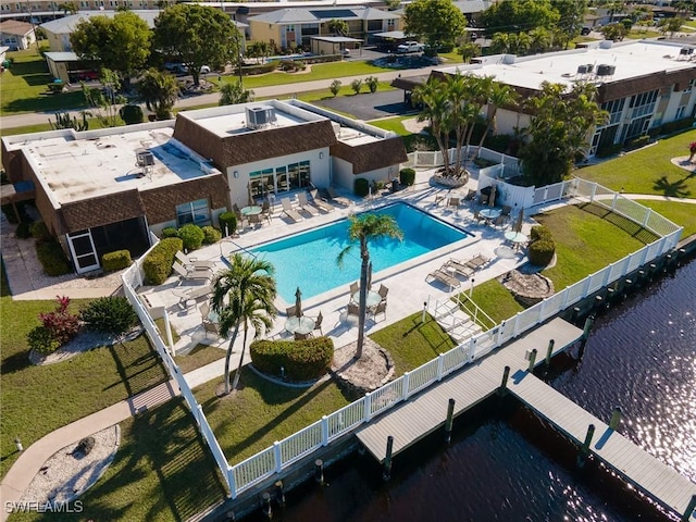 birds eye view of property featuring a water view