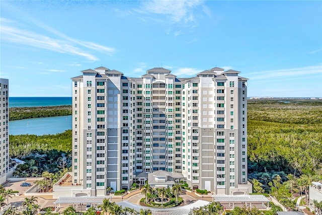 view of building exterior featuring a water view