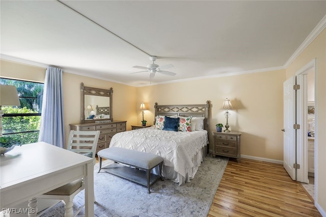 bedroom featuring ceiling fan, ornamental molding, and light wood-type flooring