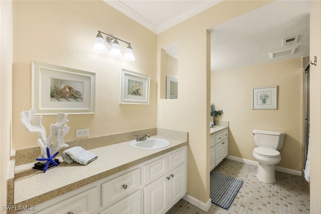 bathroom with tile patterned flooring, toilet, vanity, and ornamental molding