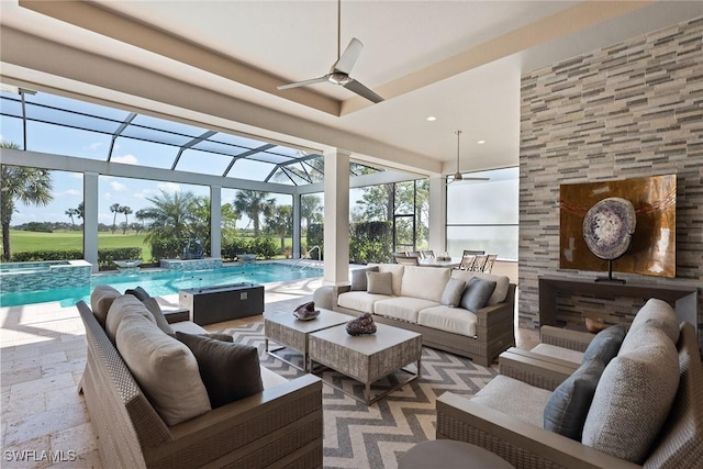 sunroom / solarium with a pool and ceiling fan