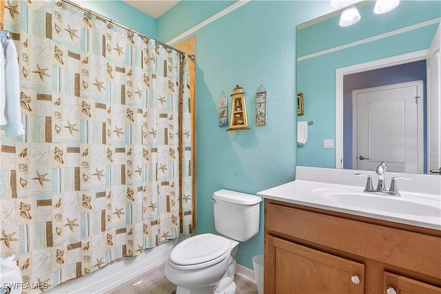 full bathroom featuring vanity, toilet, and shower / bath combo with shower curtain