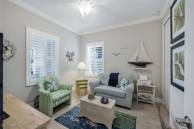 living room with baseboards, ornamental molding, a ceiling fan, and light tile patterned flooring