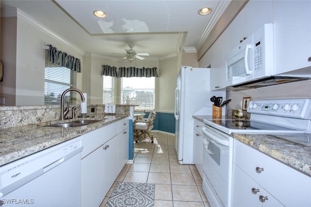 kitchen featuring white cabinets, white appliances, and sink