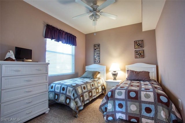 bedroom featuring ceiling fan and carpet floors