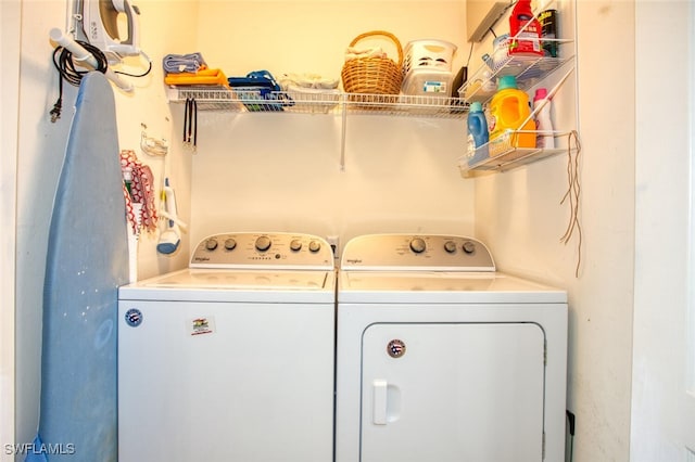 laundry room with washer and dryer