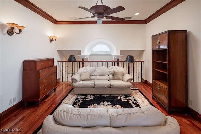 bedroom with ceiling fan, dark hardwood / wood-style flooring, and ornamental molding