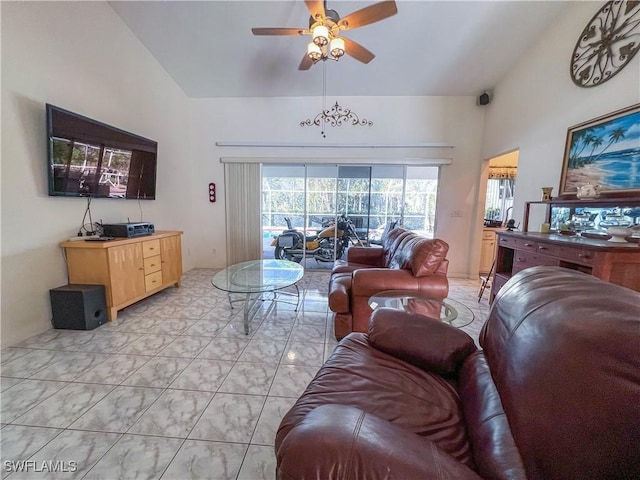 living room with ceiling fan and lofted ceiling