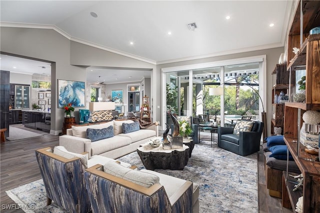 living area with visible vents, ornamental molding, wood finished floors, recessed lighting, and vaulted ceiling