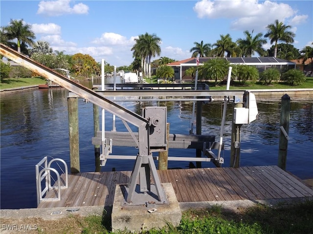 dock area featuring a water view