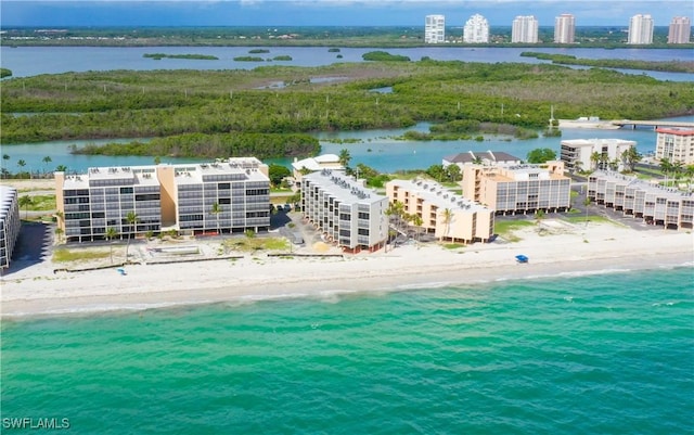 aerial view with a beach view and a water view