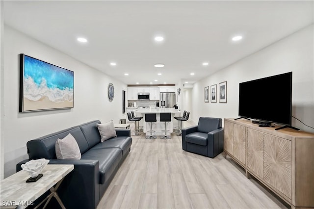 living room featuring light hardwood / wood-style floors