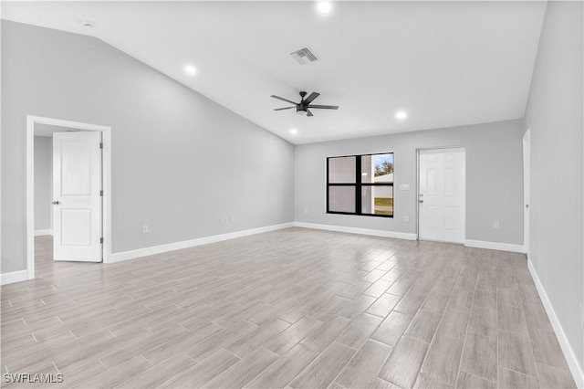 spare room with ceiling fan and lofted ceiling