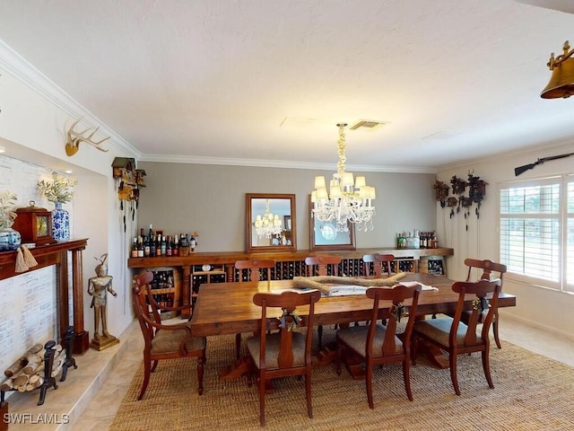 tiled dining area with ornamental molding and a notable chandelier