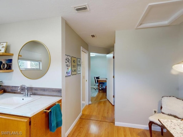 interior space with sink and light hardwood / wood-style floors