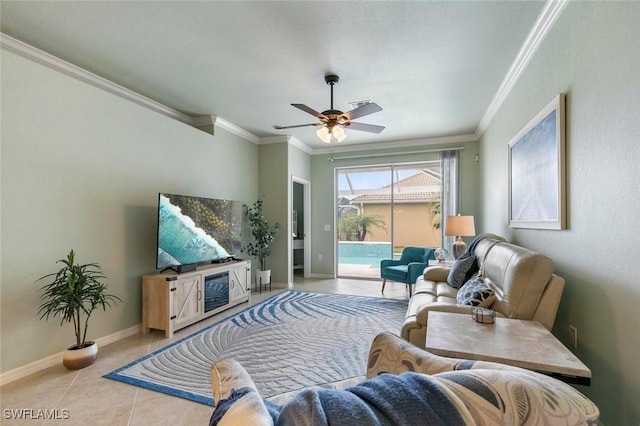 tiled living room with ceiling fan and ornamental molding