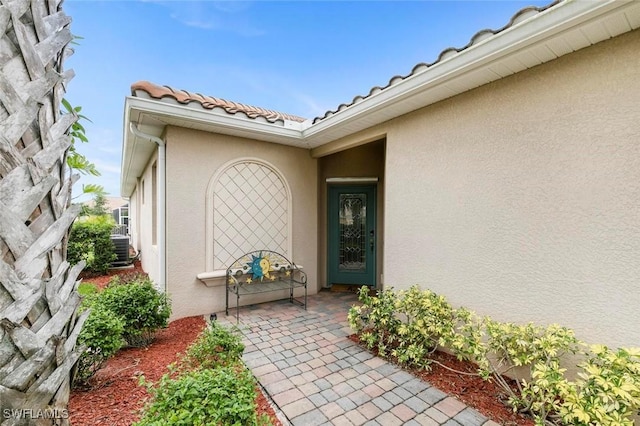 property entrance with cooling unit