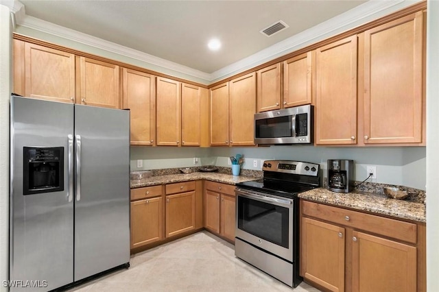 kitchen featuring light stone counters, crown molding, light tile patterned floors, and appliances with stainless steel finishes