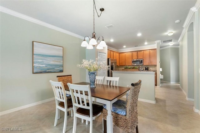 dining area featuring a notable chandelier and crown molding