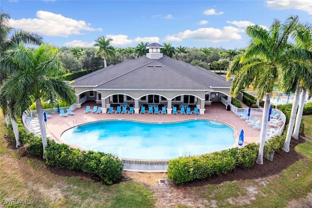 view of swimming pool featuring a patio area