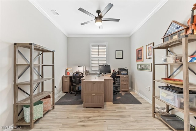 office area featuring ceiling fan, ornamental molding, and light hardwood / wood-style flooring