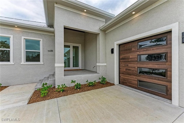 entrance to property featuring french doors