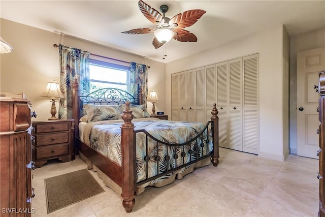 bedroom featuring ceiling fan and a closet