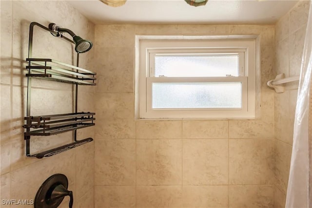 bathroom with a shower with curtain