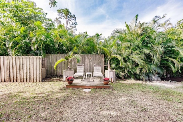 view of yard with a deck