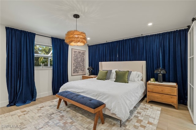 bedroom featuring light wood-type flooring