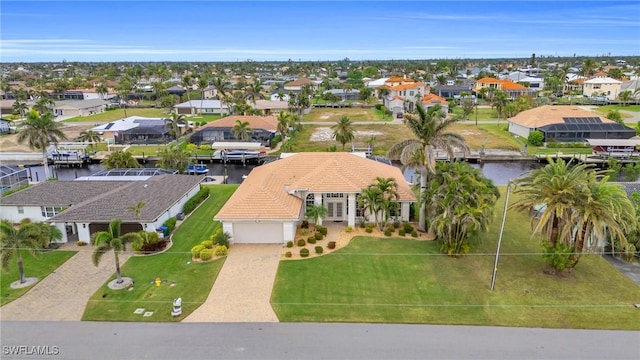 drone / aerial view featuring a water view