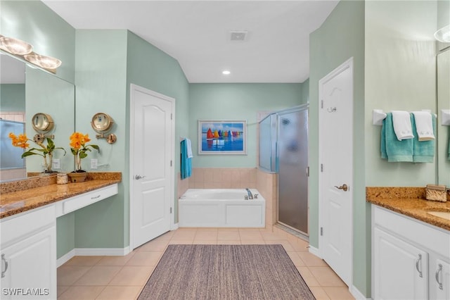 bathroom with separate shower and tub, tile patterned flooring, and vanity