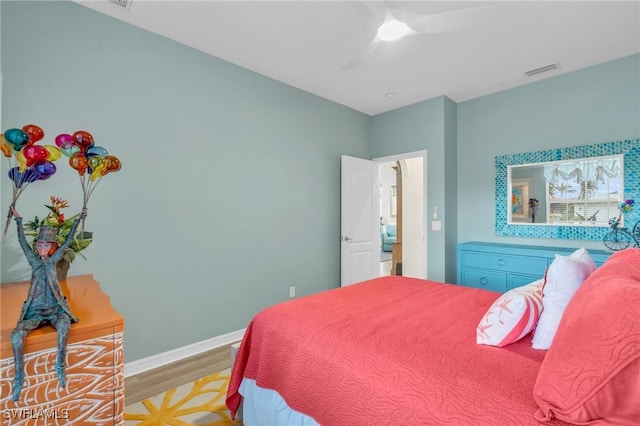 bedroom featuring ceiling fan and light hardwood / wood-style floors