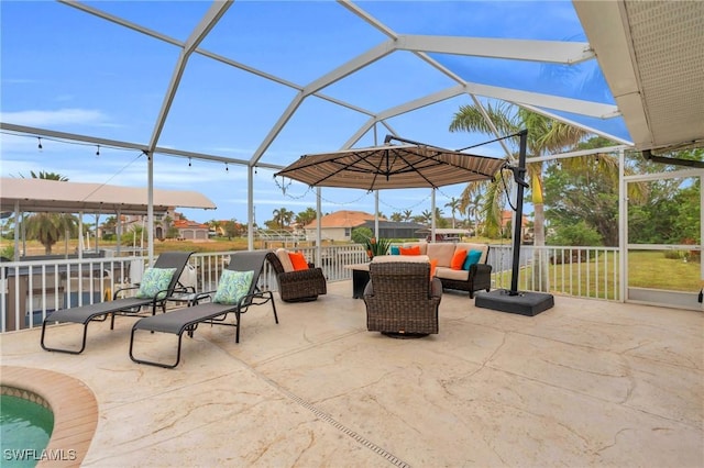 view of patio featuring a lanai and an outdoor hangout area