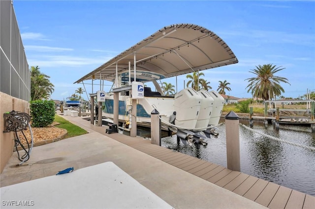 view of dock featuring a lanai and a water view