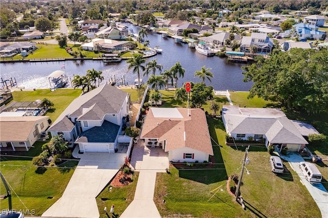 drone / aerial view with a water view