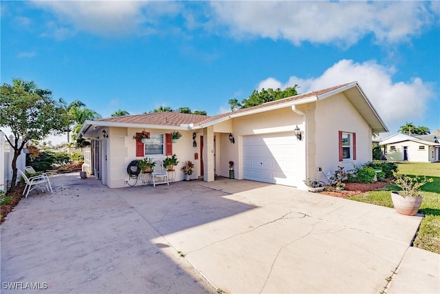 ranch-style home with a garage