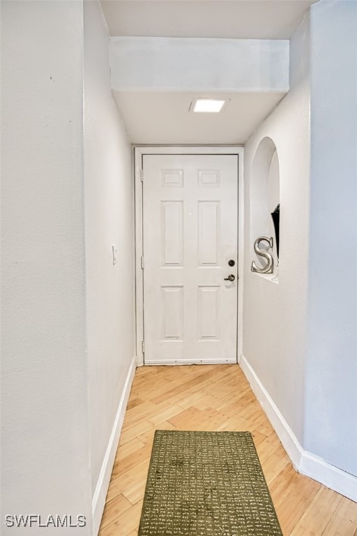 doorway to outside featuring hardwood / wood-style floors