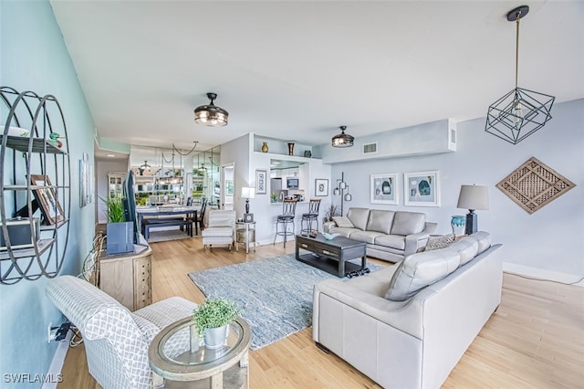 living room featuring light hardwood / wood-style flooring