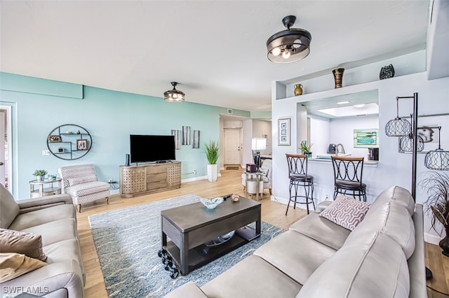 living room with wood-type flooring