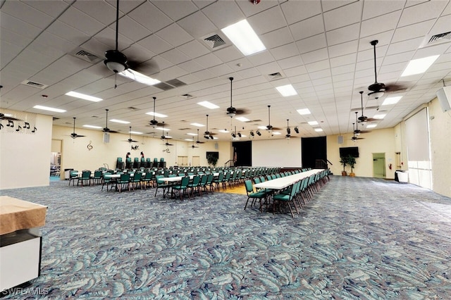 playroom with carpet floors and ceiling fan