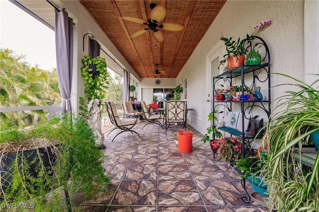 view of patio / terrace featuring covered porch and ceiling fan