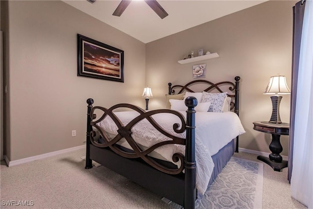 bedroom with light carpet and ceiling fan